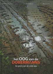 Afbeeldingen van Oog van de dobermanns #3 - Grijns van de oude aap